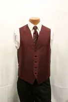 maroon vest and tie